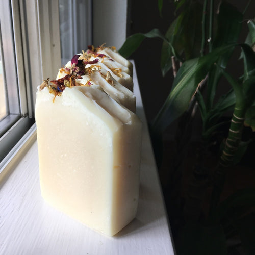 Natural colored soap bar with dried flower petals on top